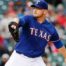 Texas Ranger baseball pitcher winding up