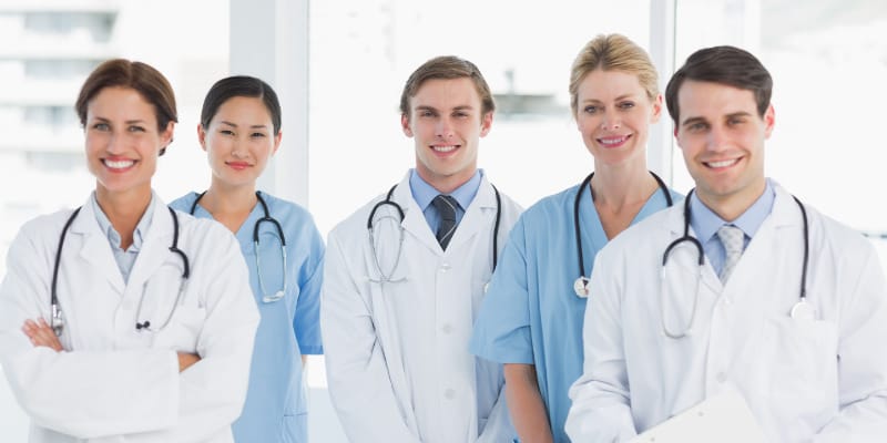 Female Male Medical Team Modern Conference Glass 2 Cropped