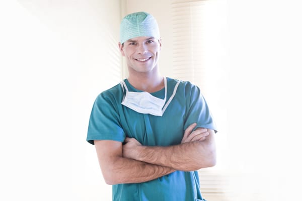 Male Young Surgeon Arms Crossed Cropped Symptoms, Clinical Examination, Lab tests and Imaging Tests of Arterial TOS