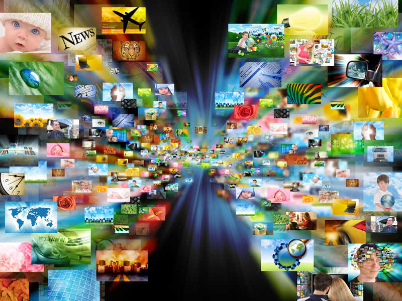 100 colorful flying media screens with news around the world